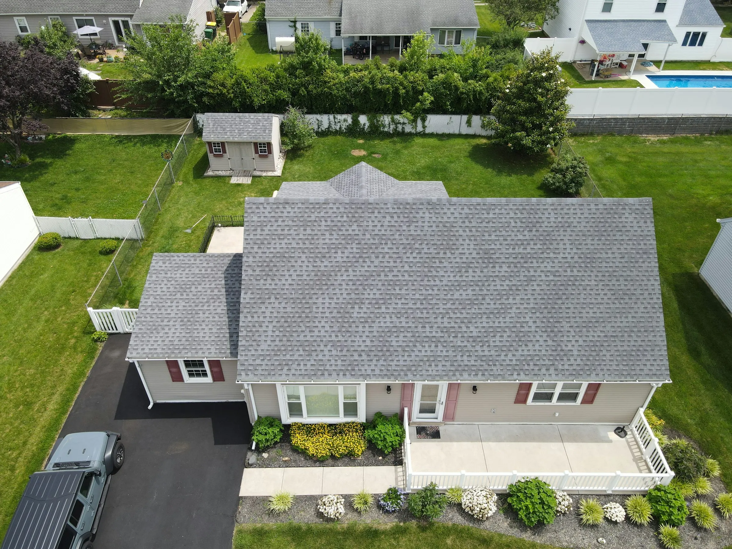 Aerial view of a residential roof after restoration
